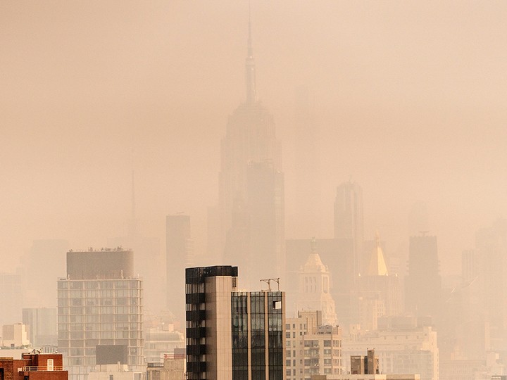  Smoke from wildfires in Canada shrouds the Empire State Building New York City.