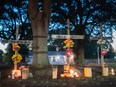 Candles burn at memorials for Angela Carr, Anolt Joseph Laguerre Jr. and Jerrald Gallion near a Dollar General store where they were shot and killed the day before on August 27, 2023 in Jacksonville, Fla.