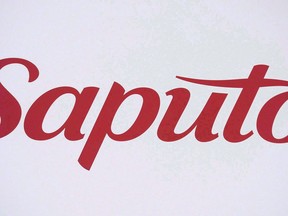 Saputo Inc. has pushed back its target date to reach its earnings forecasts amid flagging global consumer demand for milk products. A Saputo sign is shown at the company's annual general meeting in Laval, Quebec, Tuesday, August 2, 2016.