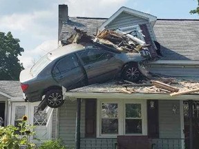 Car crashed into second floor of house.