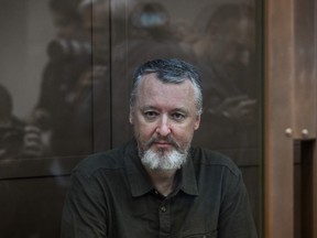 Igor Girkin (Strelkov), the former top military commander of the self-proclaimed "Donetsk People's Republic" and nationalist blogger, sits inside a glass defendants' cage during a hearing to consider an appeal on his pre-trial detention in Moscow.
