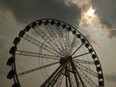 The SuperWheel under smoky skies at the Calgary Stampede in 2023.