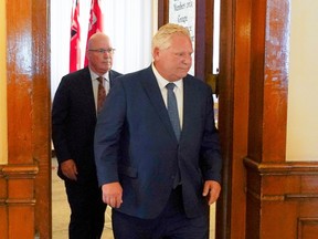 Ontario Premier Doug Ford followed by Minister of Municipal Affairs and Housing Steve Clark.