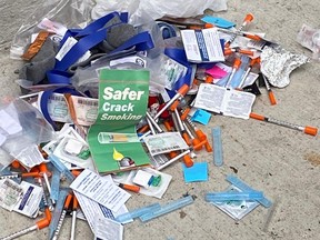 Used needles and other drug paraphernalia.