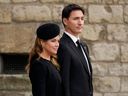 Sophie Gregoire and Justin Trudeau depart Westminster Abbey after the funeral service of Queen Elizabeth II on September 19, 2022 in London, England.