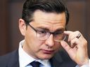 The old Pierre Poilievre with his non-froufrou glasses.