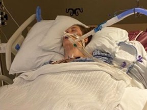 Sarah Kempinska lying in a hospital bed in a coma.