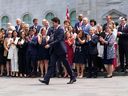 Prime Minister Justin Trudeau and members of his cabinet gather for a group photo, following a swearing-in ceremony at Rideau Hall in Ottawa on July 26, 2023.