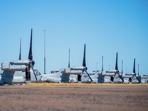 In this photo released by Australian Department of Defense, United States Marine Corps MV-22B Osprey tiltrotor aircraft are parked at RAAF Base Darwin, Australia, Aug. 11, 2023, during Exercise Alon at the Indo-Pacific Endeavour 2023. Several U.S. Marines remained in a hospital in the Australian north coast city of Darwin on Monday after they were injured in a fiery crash of a tiltrotor aircraft on an island.
