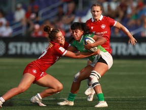 Team Canada's Chloe Daniels tackles Team Mexico's Maria Fernanda Tovar during women's rugby action at the Rugby Sevens Paris 2024 Olympic qualification event at Starlight Stadium in Langford, B.C., on Saturday, August 19, 2023.