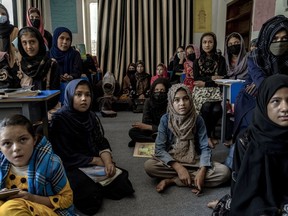 Afghan girls attend a class in an underground school, in Kabul, Afghanistan, Thursday, July 28, 2022. Ahead of the second anniversary of the Taliban takeover of Kabul, Afghan women are asking Canadians to join them in protecting gains in girls' education and resisting legitimacy for the terrorist group.