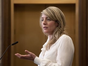 Foreign Affairs Minister Mélanie Joly responds to a question during a news conference in the foyer of the House of Commons, in Ottawa, Tuesday, May 9, 2023. Ottawa has announced it will stop providing financial assistance to Niger's government in the wake of a military coup in the West African country.
