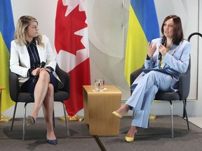 Foreign Affairs Minister Mélanie Joly and Ukrainian ambassador to Canada Yuliya Kovaliv.