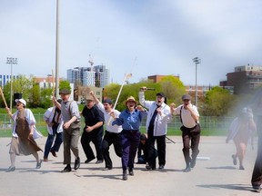 Actors are shown taking part in a Hogtown Collective theatrical production at Christie Pits park in Toronto in this undated handout image. Today marks the 90th anniversary of the Christie Pits Riot, an outbreak of violence following a softball game at a Toronto park that historians have described as one of the worst incidents of ethnically motivated unrest in the city's history.