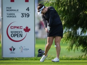 Brigitte Kim Thibault, of Canada, hits her tee shot on the 14th hole during the second round at the LPGA CPKC Canadian Women's Open golf tournament, in Vancouver, on Friday, August 25, 2023.