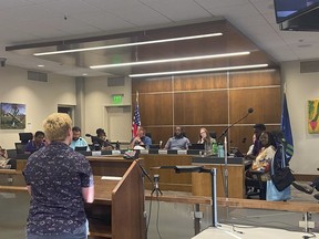Archer Trip tells the Waterloo City Council on Aug. 21, 2023, about their experiences of undergoing conversion therapy as a child, in Waterloo, Iowa.