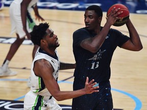 Scarborough Shooting Stars' Kalif Young, right, protects the ball against Niagara River Lions' A.J. Davis during the Canadian Elite Basketball League Eastern Conference final in Langley, B.C. in this Friday, Aug. 11, 2023 handout photo.
