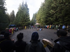 Canada's highest court has refused to hear an appeal of a British Columbia Supreme Court decision that acquitted a demonstrator of criminal contempt for taking part in a blockade of old-growth logging on Vancouver Island. Elders for Ancient Forests along with people declaring themselves "land defenders" take part in a peace circle along a logging road in the Fairy Creek logging area near Port Renfrew, B.C. Tuesday, Oct. 5, 2021.