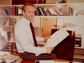 A copy of an archival photo of Keith Spicer during his time as Editor-in-Chief of the Ottawa Citizen.