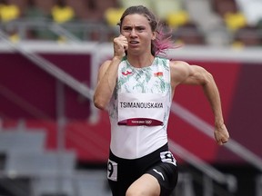 FILE - Krystsina Tsimanouskaya, of Belarus, runs in the women's 100-meter run at the 2020 Summer Olympics, Japan, on July 30, 2021. Tsimanouskaya, the Belarusian sprinter whose team tried to force her out of the Tokyo Olympics, has been declared eligible to represent Poland ahead of the upcoming world championships. Tsimanouskaya's profile on the website of World Athletics, track and field's governing body, was updated Monday Aug. 7, 2023 with a note that she became eligible to compete for Poland the day before.