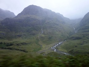 The Scottish Highlands are shown in this 2017 photo. Police say the bodies of three missing hikers have been recovered from a mountain in the Scottish Highlands. A search for the trio began Saturday night when they didn't return from hiking along a notoriously narrow ridge in Glen Coe. A Coastguard helicopter flying in fog and mist located the bodies and a search and rescue crew returned Sunday to recover them.