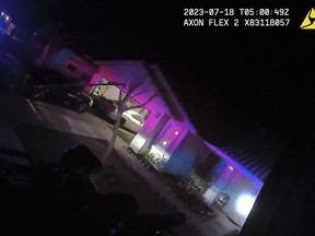 This Monday evening, July 17, 2023 image taken from police body camera video provided by the Las Vegas Metropolitan Police Department, shows a home SWAT officers raided a home in the nearby city of Henderson, Nev., in connection with the 1997 killing of rapper Tupac Shakur near the Las Vegas Strip. (Las Vegas Metropolitan Police Department via AP)