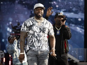 FILE - 50 Cent, left, and Tony Yayo perform at the Wireless Music Festival in Finsbury Park, July 9, 2023, in London. Rapper 50 Cent said Monday, Aug. 28, that his scheduled show Tuesday night, Aug. 29, at Talking Stick Resort Amphitheatre, an outdoor venue in west Phoenix, was postponed because of the sweltering weather.