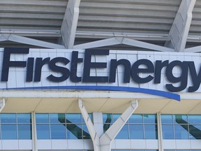 FILE - The signage for FirstEnergy Stadium is visible on the facade before an NFL preseason football game, Aug. 27, 2022, in Cleveland. The Ohio-based utility company says it's being investigated by a state office focused on organized crime in connection with payments the company made to the state's former House speaker and a top utility regulator, a news outlet reported Wednesday, Aug. 2, 2023.
