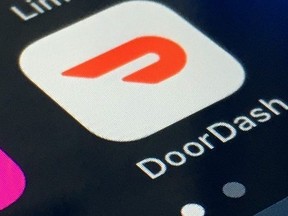 FILE - The DoorDash app is shown on a smartphone, Feb. 27, 2020, in New York. Seattle's Office of Labor Standards said Monday, Aug. 21, 2023, that DoorDash -- a San Francisco-based app that contracts so-called gig workers to make food deliveries -- again violated requirements by the city to provide paid sick and safe time to workers. (AP Photo, File)