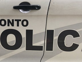 A Toronto police vehicle is shown in Toronto on Wednesday, Aug. 2, 2023. Toronto police say one person was stabbed and eight others were injured during a protest in the city's west end today.