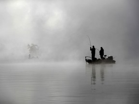 Anglers compete in a bass fishing tournament on Oct. 1, 2017, in Bridgeton, Maine. Canadian Chris Johnston remains in the hunt for his second Elite Series event on the St. Lawrence River.
