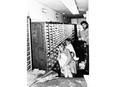 FILE - In this photo released by police, three of the four hostages and bank robber Clark Olofsson, standing right, are seen in a bank in Stockholm, Sweden, Aug. 27, 1973, shortly before the gunmen were overwhelmed by police. This week marks 50 years since a failed bank robbery that gave rise to the Stockholm syndrome, a term used in psychology to describe the bond that victims of kidnappings or hostage situations sometimes develop with their captors. (AP Photo, File)