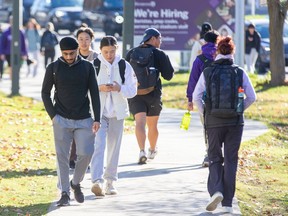 Students walking on a university campus.
