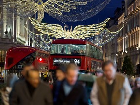 FILE - Christmas lights are displayed on Regent Street in London on Nov. 24, 2022. The rate of inflation in the U.K. fell sharply in July to a 17-month low largely on the back of lower energy prices, official figures showed Wednesday, Aug. 16, 2023, a welcome development for hard-pressed households struggling during the cost of living crisis.