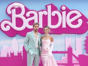 FILE - Ryan Gosling, left, and Margot Robbie pose for photographers upon arrival at the premiere of the film 'Barbie' on July 12, 2023, in London. "Barbie" is set to open across the Middle East on Thursday, Aug. 10, but moves by Kuwait and Lebanon to ban the film -- apparently over it's alleged LGBTQ themes -- has raised questions over how widely it will be released.