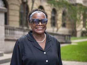 FILE - Kathleen McElroy poses Tuesday, June 13, 2023, in College Station, Texas. Texas A&M University reached a $1 million settlement Thursday, Aug. 3, 2023, with McElroy, a Black journalism professor, after botched attempts to hire her unraveled after pushback over her past work promoting diversity.