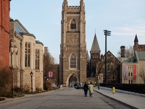 People walking on the University of Toronto campus.