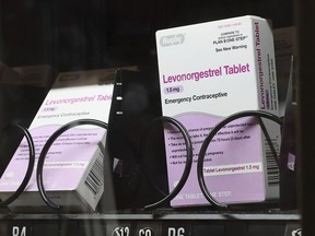FILE - The emergency contraceptive levonorgestrel is displayed for sale in a vending machine on the campus of the University of Washington in Seattle on Friday, June 2, 2023. Taking piroxicam, which is typically prescribed for arthritis, together with the morning-after pill levonorgestrel could boost its effectiveness when taken up to three days after unprotected sex, according to new research published Wednesday, Aug. 16, 2023.