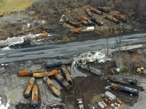 FILE - Cleanup of portions of a Norfolk Southern freight train that derailed Friday night in East Palestine, Ohio, continues on Feb. 9, 2023.