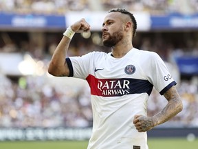 PSG's Neymar celebrates after scoring the first goal during a friendly soccer match against Jeonbuk Hyundai Motors in Busan, South Korea, Thursday, Aug. 3, 2023.