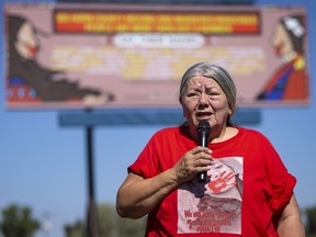 Kaysera Stops Pretty Places' grandmother Yolanda Fraser speaks during a dedication ceremony for a billboard in support of the Missing and Murdered Indigenous People movement on Aug. 29, along I-90 in Hardin, Mont.