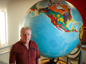 University of Calgary professor Dr. Alan Hildebrand was photographed in the university’s Earth Sciences library on Tuesday, September 26, 2023.