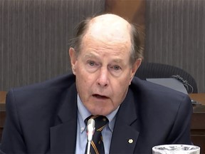 Former Bank of Canada governor David Dodge speaks at a House of Commons finance committee meeting.