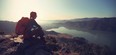 happy woman looking out a beautiful scenery