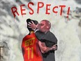 A mural by Italian street artist Salvatore Benintende aka TvBoy depicts Spanish Football Federation President Luis Rubiales kissing Spanish midfielder Jenni Hermoso during the Women's World Cup awards ceremony in Barcelona on Sept. 1, 2023.