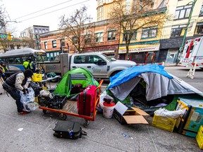 City of Vancouver staff removing the homeless from DTES