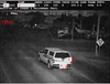 A marked photo radar vehicle is pictured just before it runs a red light at Yellowhead Trail and 127 Street in Edmonton in June 2021.