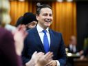 Conservative Leader Pierre Poilievre is applauded after speaking during during question period in the House of Commons on Wednesday, Sept. 20, 2023.