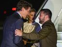 Canadian Prime Minister Justin Trudeau greets Ukrainian President Volodymyr Zelenskyy, as his wife Olena Zelenska looks on, as they arrive at the Ottawa airport for a visit to Canada, on Thursday, Sept. 21, 2023. 