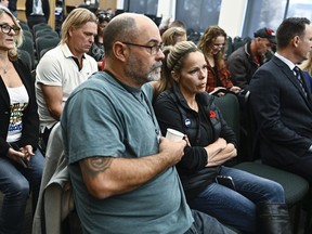 Two convoy protest organizers are preparing to answer to criminal charges in court for their part in the massive demonstration that gridlocked Ottawa last year. Convoy organizers Chris Barber and Tamara Lich sit in the gallery as they wait for the start of the day's hearings at the Public Order Emergency Commission in Ottawa on Wednesday, Nov. 2, 2022.